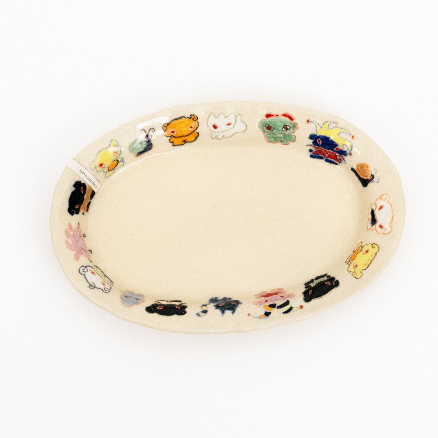 Nomi Plate