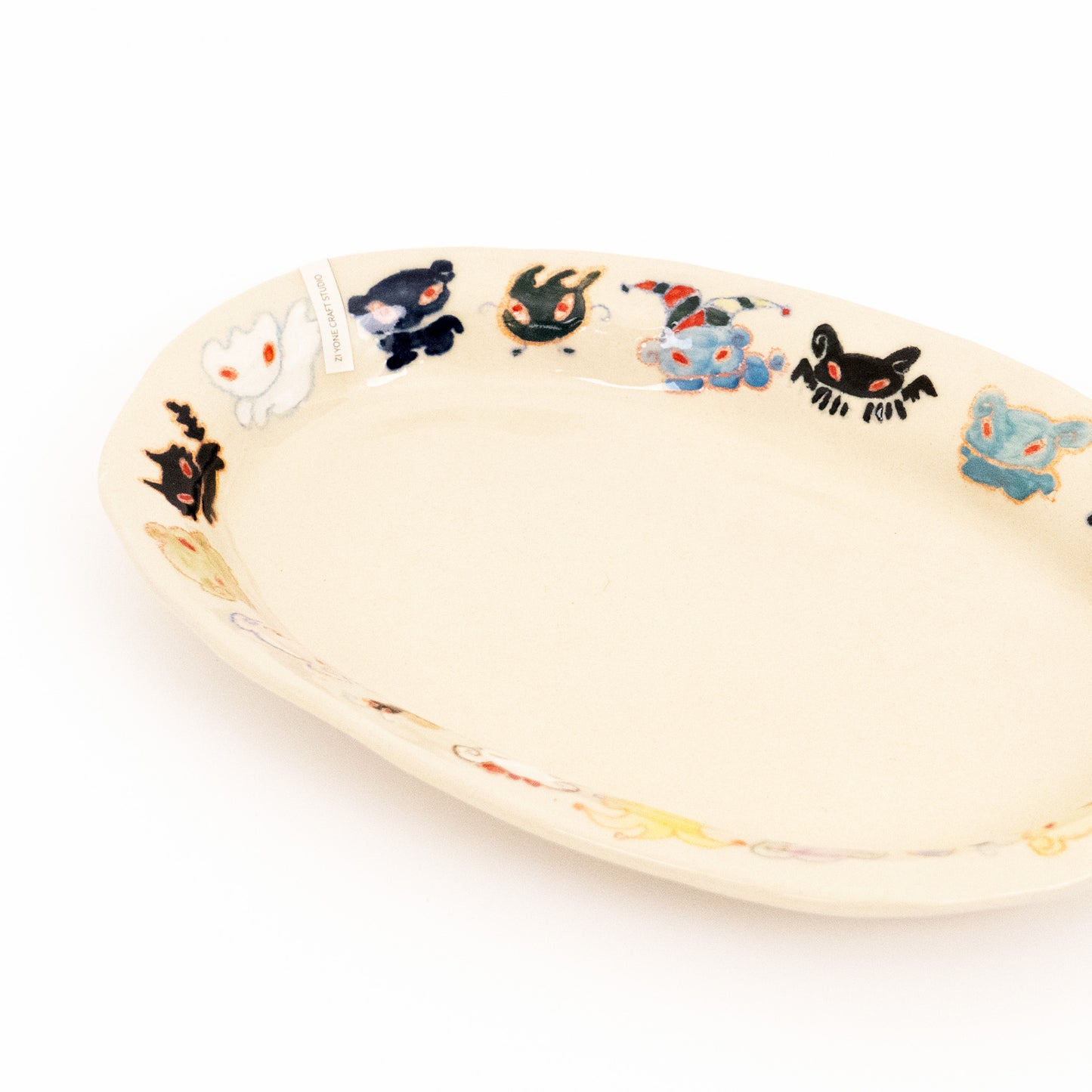 Nomi Plate