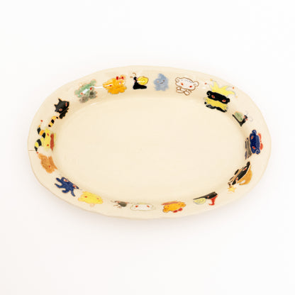 Nomi Plate