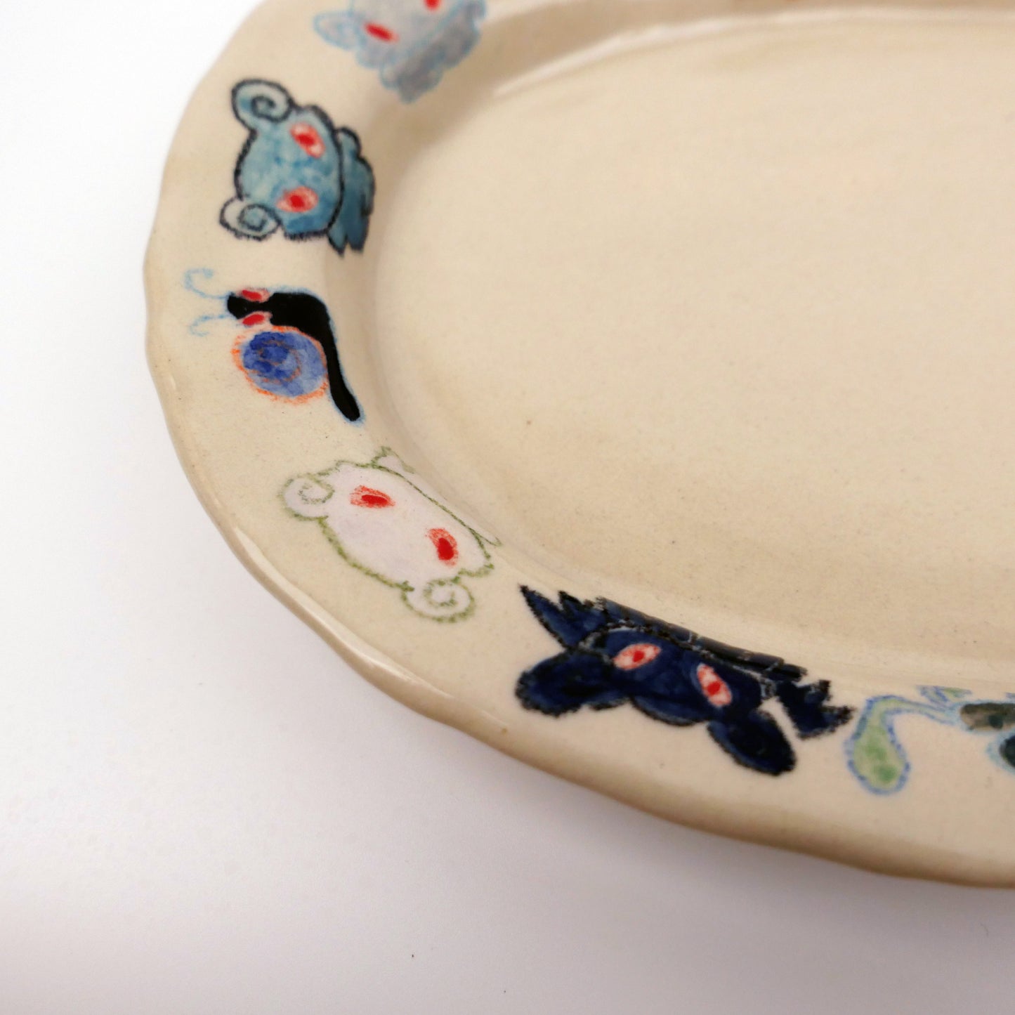 Nomi Plate