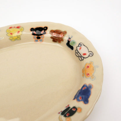 Nomi Plate