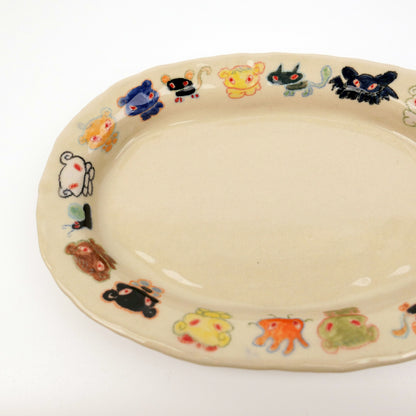 Nomi Plate
