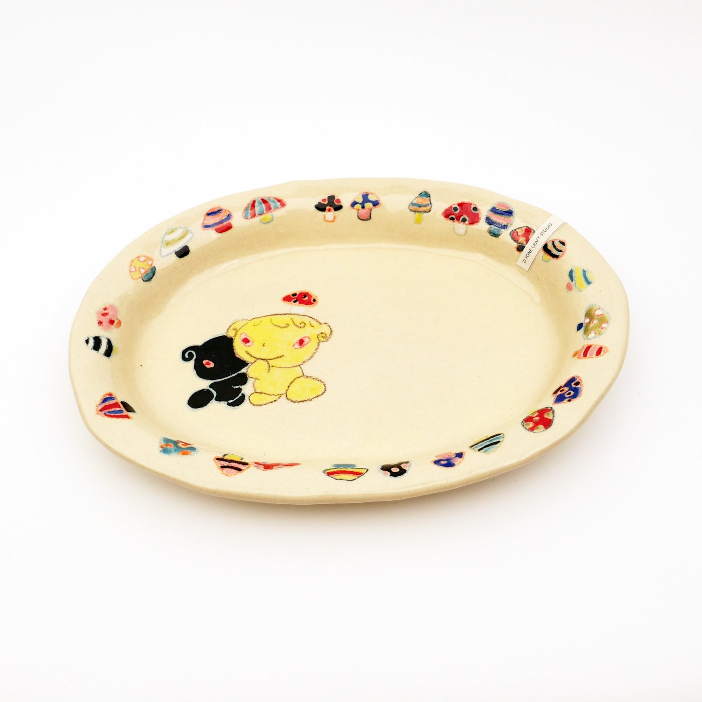 Nomi Plate