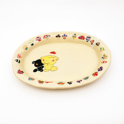 Nomi Plate