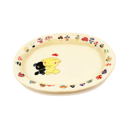 Nomi Plate