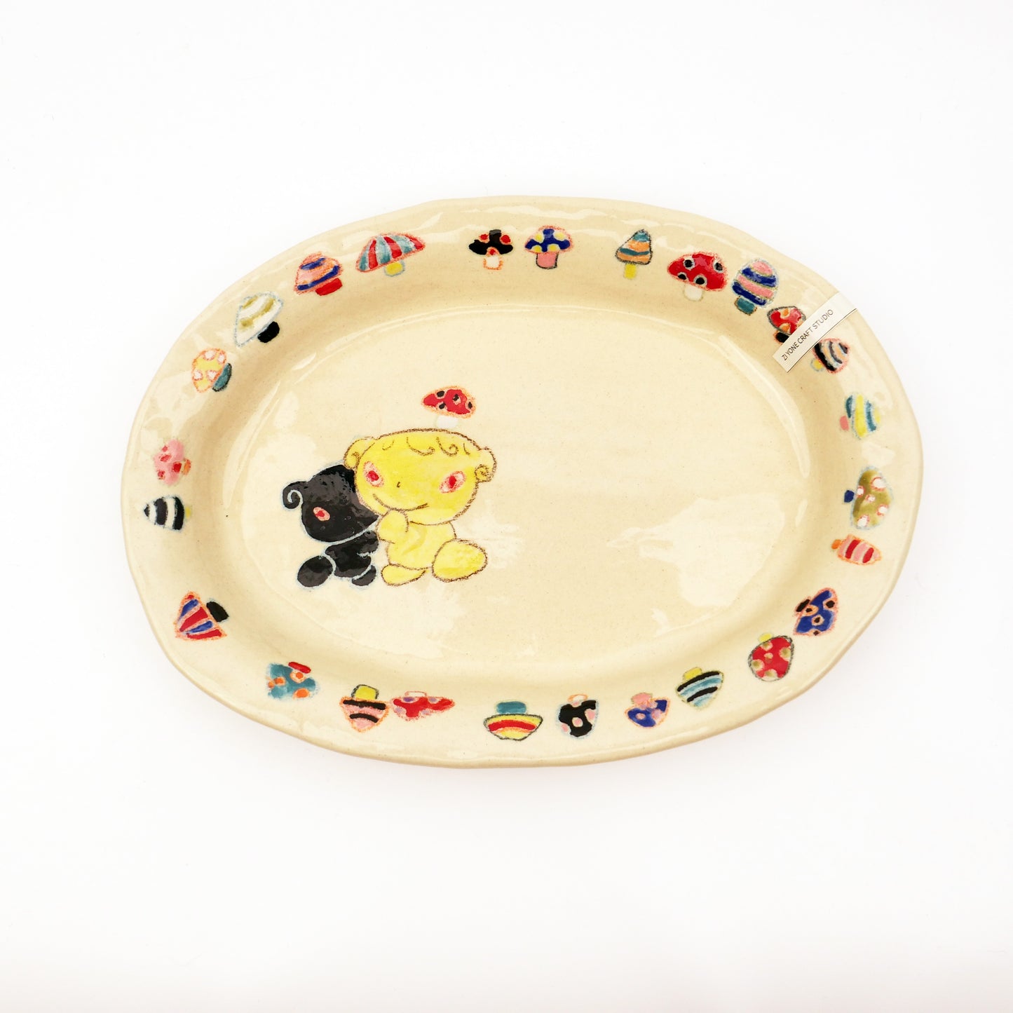 Nomi Plate