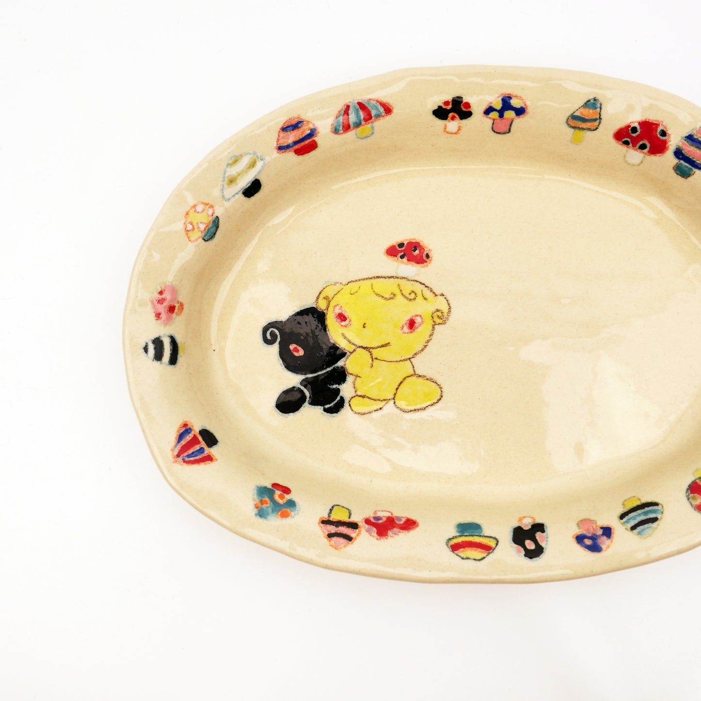 Nomi Plate
