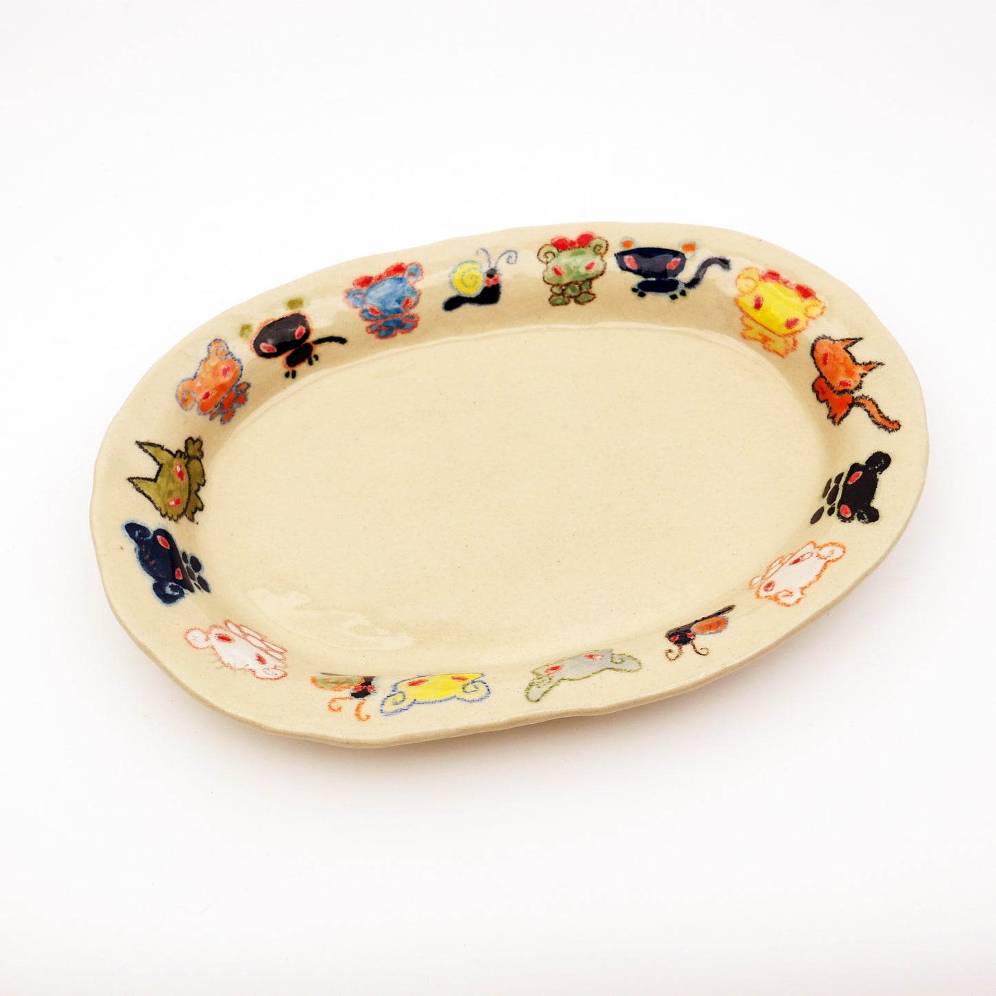 Nomi Plate
