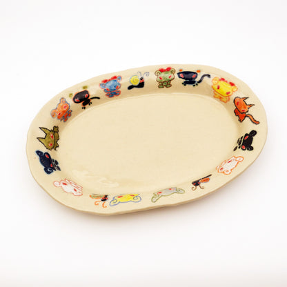 Nomi Plate