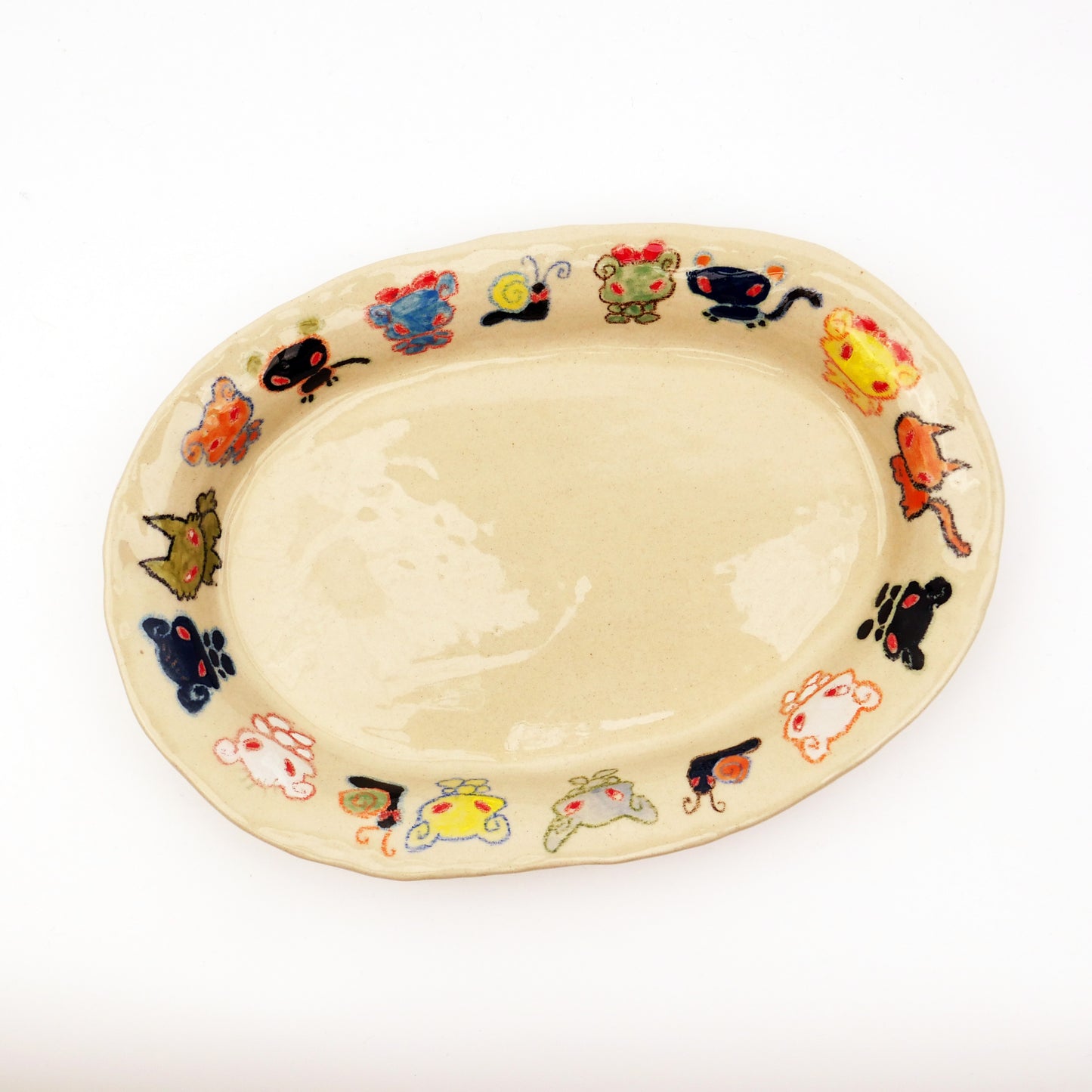 Nomi Plate