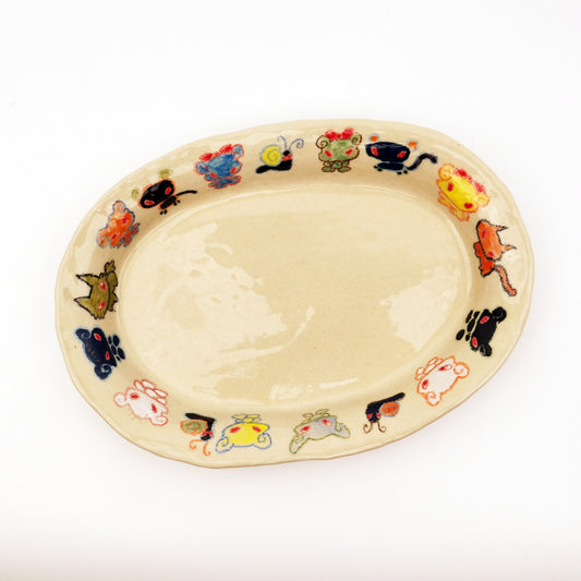 Nomi Plate