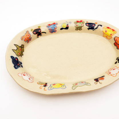 Nomi Plate