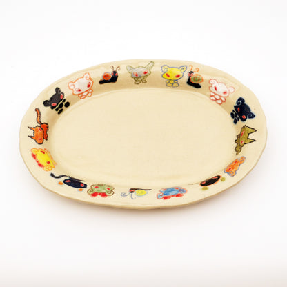 Nomi Plate