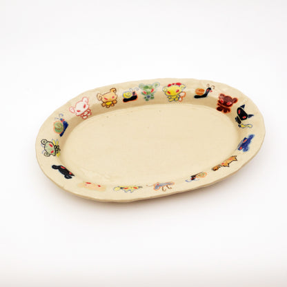 Nomi Plate