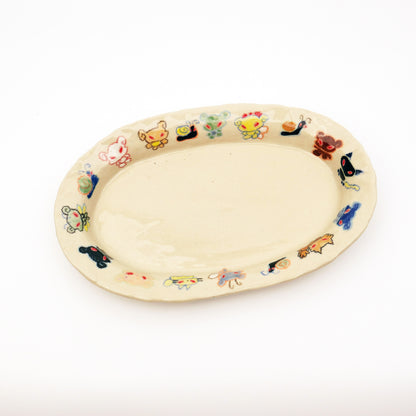 Nomi Plate