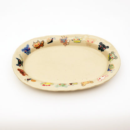 Nomi Plate